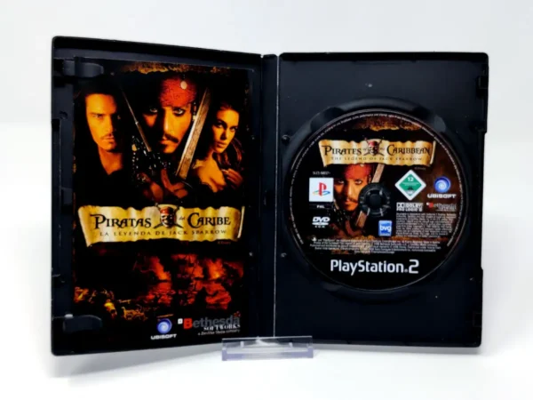 Interior del juego Piratas del Caribe: La Leyenda de Jack Sparrow (ESP) (Rebajado) para PlayStation 2 con disco y manual