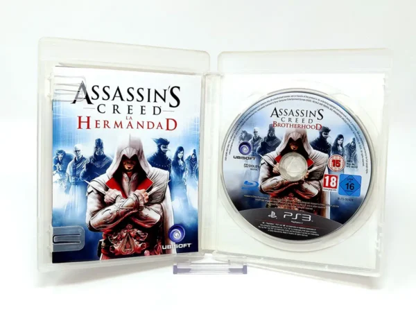 Interior del juego Assassin's Creed: La Hermandad (ESP) (v2) para PlayStation 3 con disco y manual