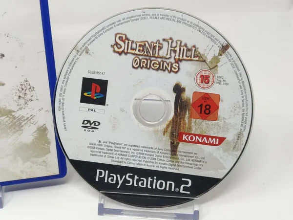 Interior del juego Silent Hill: Origins (ESP) para PlayStation 2 con disco y manual