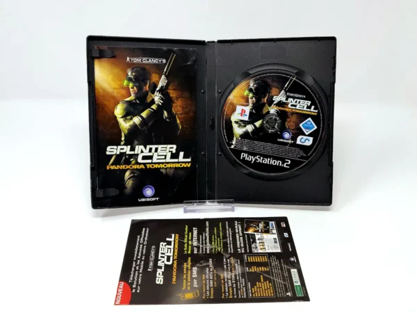 Interior del juego Tom Clancy's Splinter Cell: Pandora Tomorrow (FRA) para PlayStation 2 con disco y manual