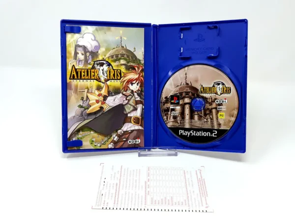 Interior del juego Atelier Iris: Eternal Mana (ITA) para PlayStation 2 con disco y manual