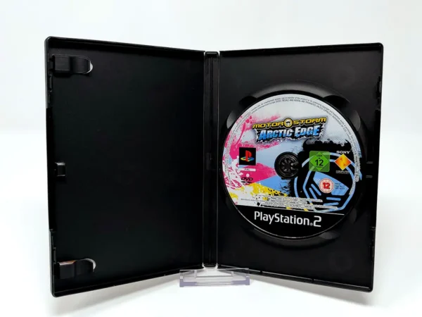 Interior del juego MotorStorm: Arctic Edge (FRA) (Rebajado) para PlayStation 2 con disco y manual