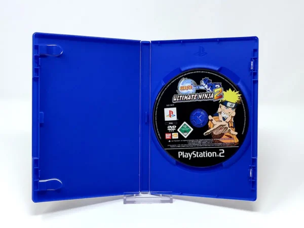 Interior del juego Naruto: Ultimate Ninja 2 (ITA) (Rebajado) para PlayStation 2 con disco y manual