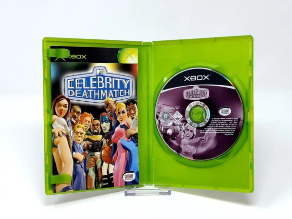 Interior del juego MTV Celebrity Deathmatch (ESP) para XBOX con disco y manual