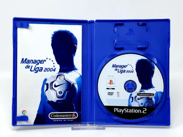 Interior del juego Manager de Liga 2004 (ESP) para PlayStation 2 con disco y manual