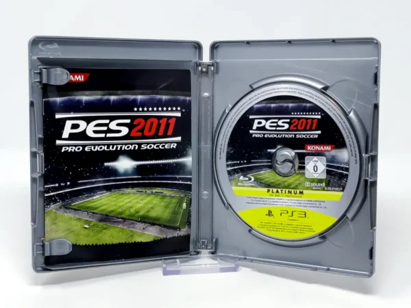 Interior del juego PES 2011: Pro Evolution Soccer (ESP) (Platinum) para PlayStation 3 con disco y manual