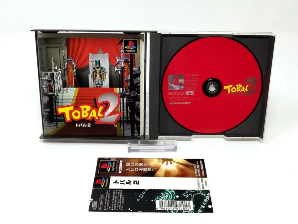 Interior del juego Tobal 2 (JAP) para PlayStation 1 con disco y manual