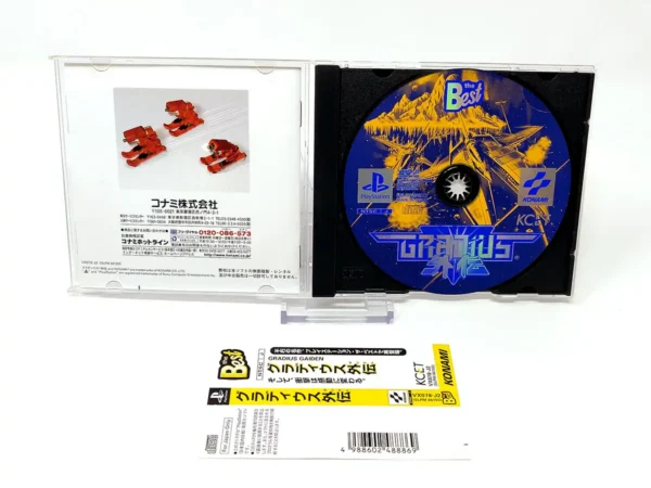 Interior del juego Gradius Gaiden (JAP) para PlayStation 1 con disco y manual