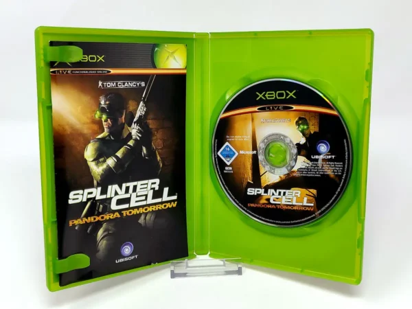 Interior del juego Tom Clancy's Splinter Cell: Pandora Tomorrow (ESP) para XBOX con disco y manual