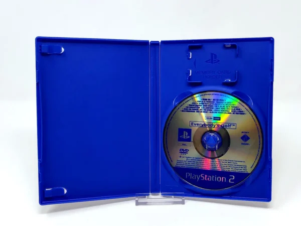 Interior del juego Everybody's Golf (FRA) (Promo) para PlayStation 2 con disco y manual