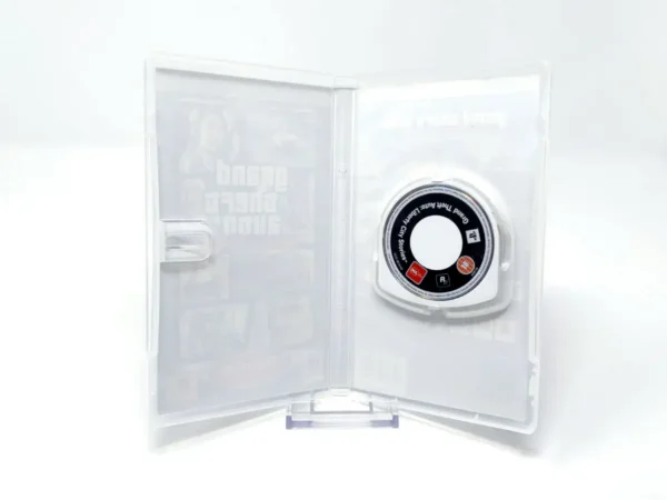 Interior del juego Grand Theft Auto: Liberty City Stories (UK) (Platinum) (Rebajado) para PSP con disco y manual