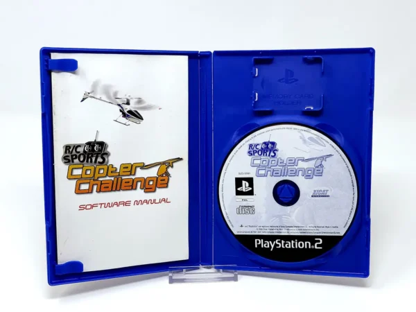 Interior del juego R/C Sports Copter Challenge (ESP) para PlayStation 2 con disco y manual