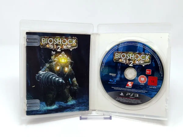 Interior del juego BioShock 2 (ESP) para PlayStation 3 con disco y manual