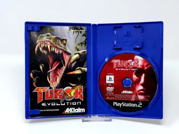 Interior del juego Turok: Evolution (ESP) para PlayStation 2 con disco y manual