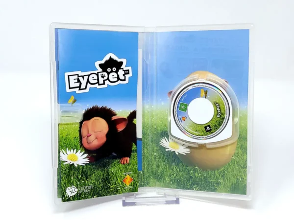 Interior del juego EyePet (ESP) para PSP con disco y manual