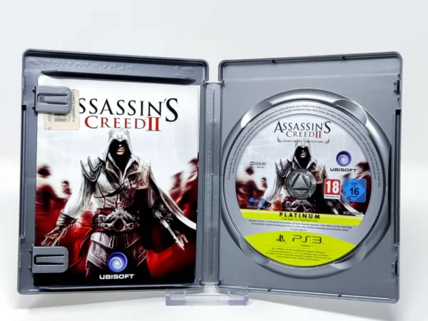 Interior del juego Assassin's Creed II (GOTY) (ESP) (Platinum) (Rebajado) para PlayStation 3 con disco y manual