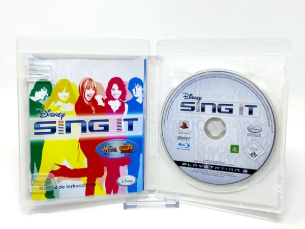 Interior del juego Disney Sing It (ESP) para PlayStation 3 con disco y manual