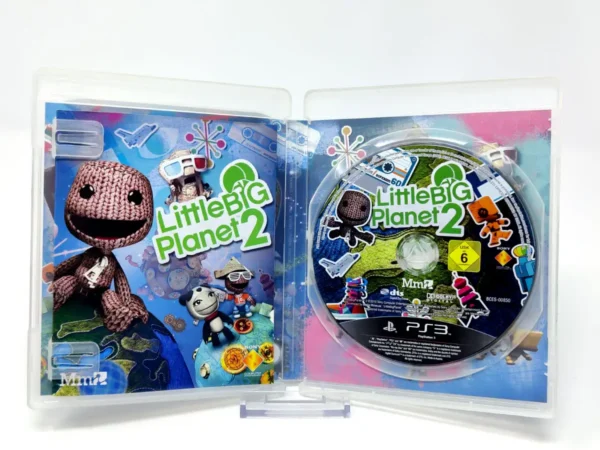 Interior del juego LittleBigPlanet 2 (ESP) para PlayStation 3 con disco y manual
