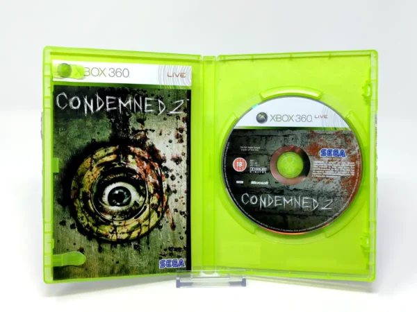 Interior del juego Condemned 2 (ESP) para XBOX 360 con disco y manual