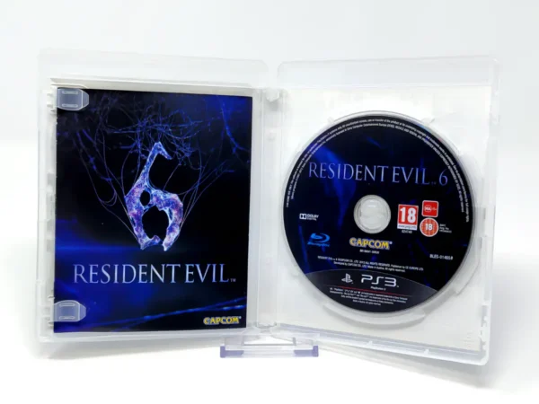 Interior del juego Resident Evil 6 (ESP) para PlayStation 3 con disco y manual
