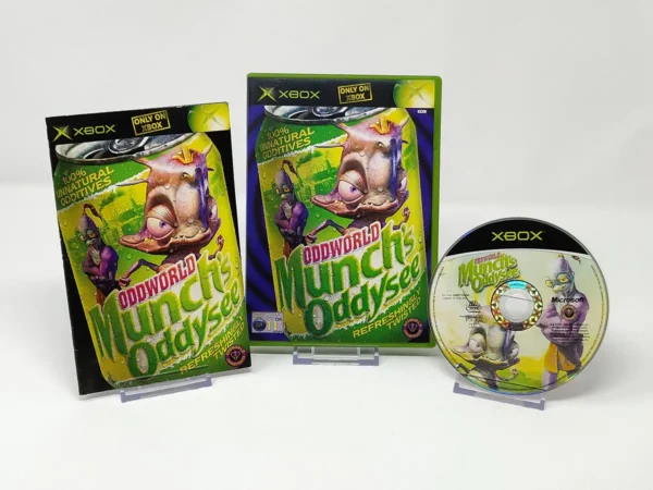 Interior del juego Oddworld: Munch's Oddysee (UK) para XBOX con disco y manual