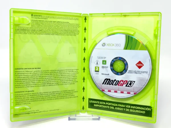 Interior del juego MotoGP 13 (ESP) para XBOX 360 con disco y manual