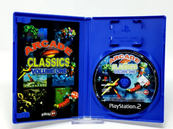 Interior del juego Arcade Classics Volume 1 (ESP) para PlayStation 2 con disco y manual