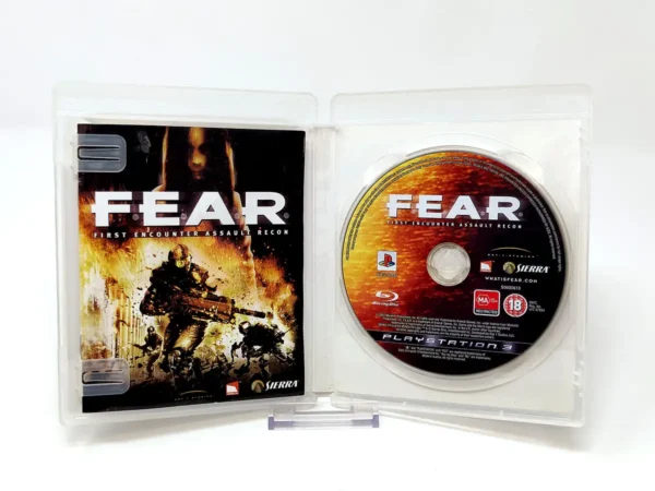 Interior del juego F.E.A.R.: First Encounter Assault Recon (ESP) para PlayStation 3 con disco y manual