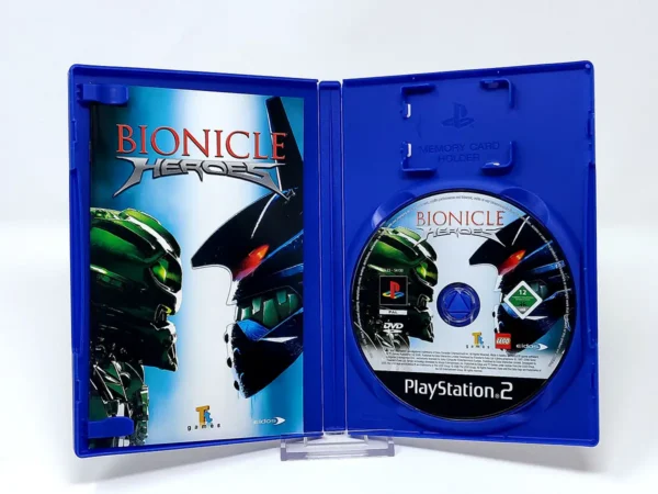 Interior del juego Bionicle Heroes (FRA) para PlayStation 2 con disco y manual
