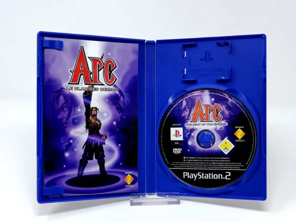 Interior del juego Arc: Le Clan Des Demos (FRA) para PlayStation 2 con disco y manual
