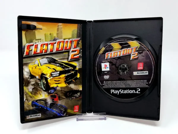 Interior del juego FlatOut 2 (FRA) para PlayStation 2 con disco y manual
