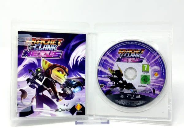 Interior del juego Ratchet & Clank: Nexus (ESP) para PlayStation 3 con disco y manual
