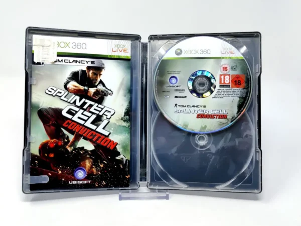 Interior del juego Tom Clancy's Splinter Cell: Conviction (ESP) (Steelbook) (Rebajado) para XBOX 360 con disco y manual
