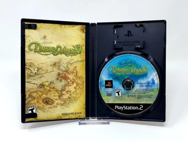 Interior del juego Dawn of Mana (USA) para PlayStation 2 con disco y manual
