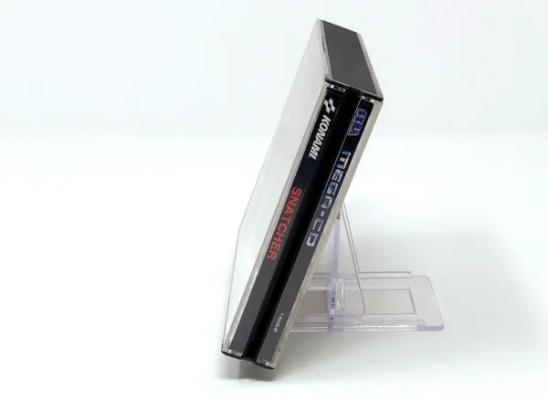 Lateral de la caja de Snatcher (UK) para Sega Mega Drive