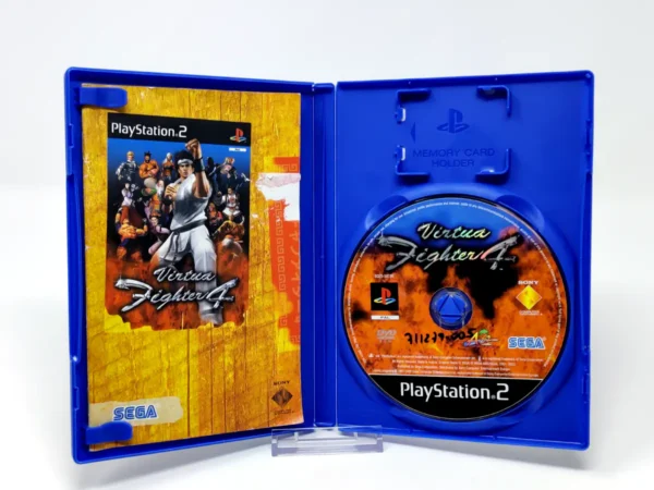 Interior del juego Virtua Fighter 4 (ESP) (Rebajado) para PlayStation 2 con disco y manual