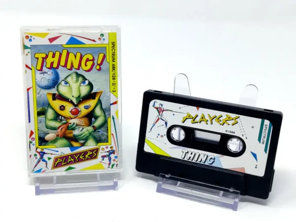 Interior del juego Thing! para Sinclair ZX Spectrum con disco y manual