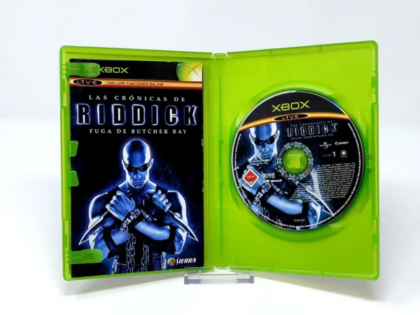 Interior del juego Las Crónicas de Riddick: La Fuga de Butcher Bay (ESP) para XBOX con disco y manual