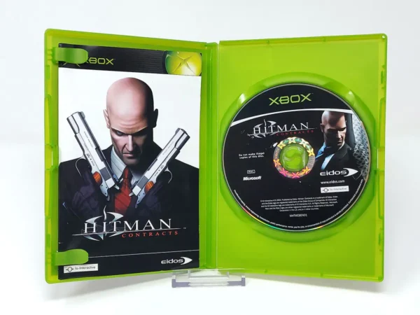 Interior del juego Hitman: Contracts (UK) para XBOX con disco y manual
