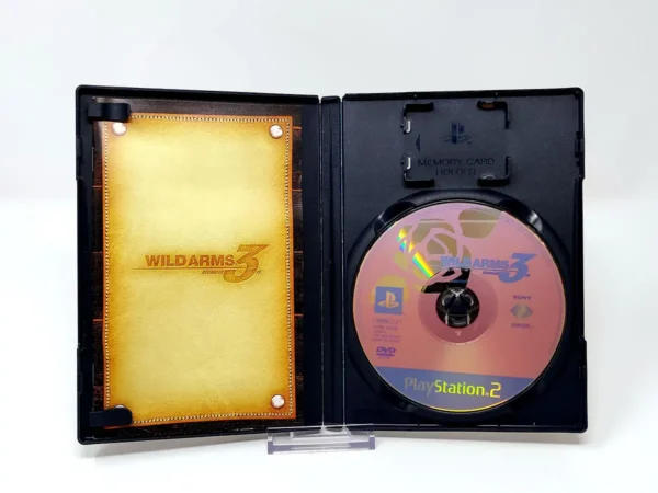 Interior del juego Wild Arms Advanced 3rd (JAP) para PlayStation 2 con disco y manual