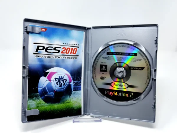 Interior del juego PES 2010: Pro Evolution Soccer (ESP) (Platinum) para PlayStation 2 con disco y manual