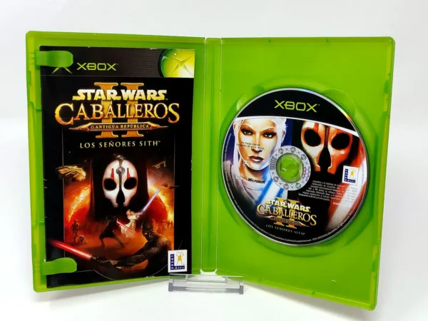 Interior del juego Star Wars: Caballeros de la Antigua República II: Los Señores Sith (ESP) para XBOX con disco y manual