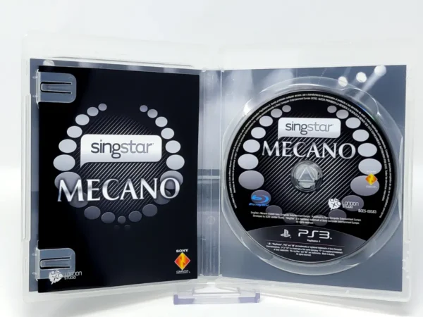 Interior del juego SingStar Mecano (ESP) para PlayStation 3 con disco y manual