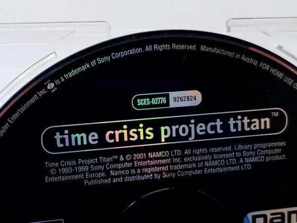 Interior del juego Time Crisis: Project Titan (EUR) (Promo) para PlayStation 1 con disco y manual