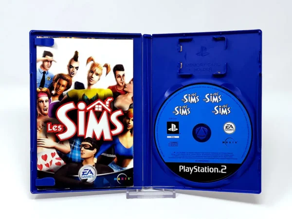 Interior del juego Les Sims (FRA) para PlayStation 2 con disco y manual