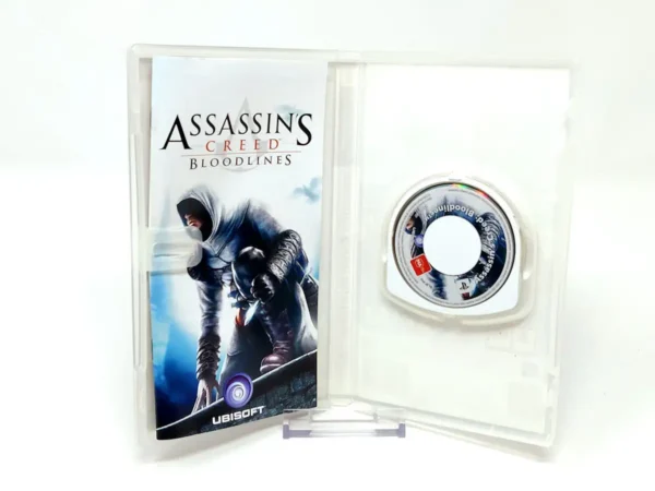 Interior del juego Assassin's Creed: Bloodlines (ESP) para PSP con disco y manual