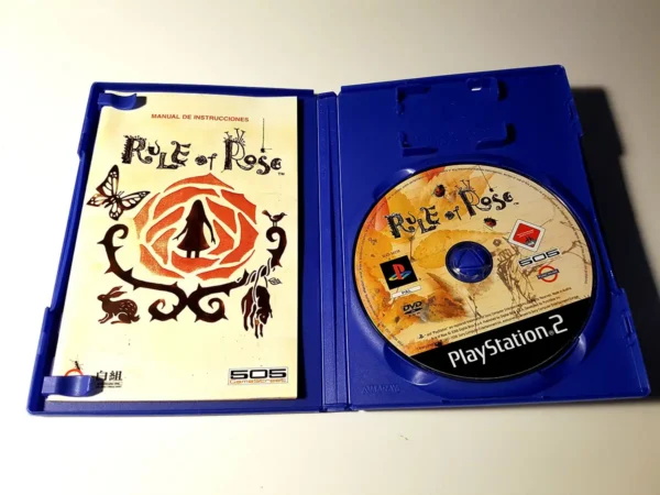 Interior del juego Rule of Rose (ESP) para PlayStation 2 con disco y manual
