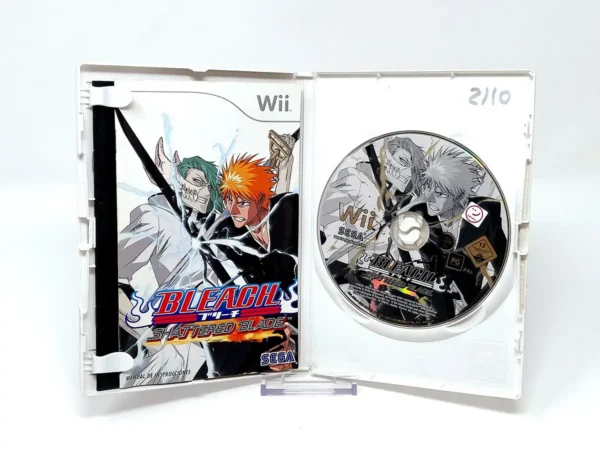 Interior del juego Bleach: Shattered Blade (ESP) para Nintendo Wii con disco y manual