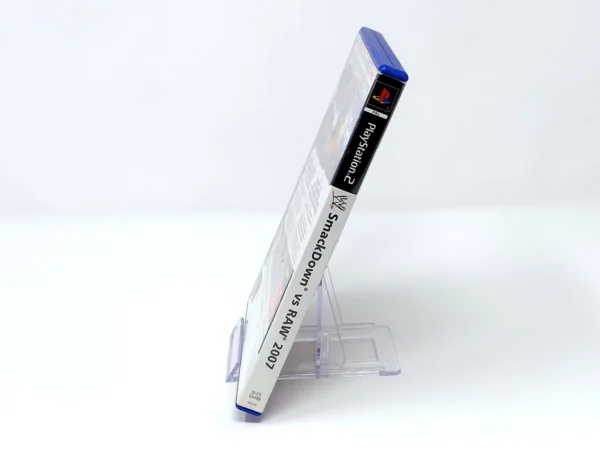 Lateral de la caja de WWE SmackDown vs. Raw 2007 (FRA) (Rebajado) para PlayStation 2