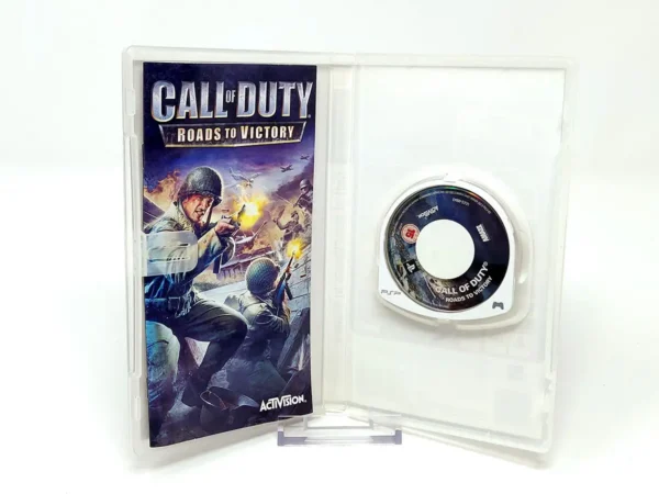 Interior del juego Call of Duty: Roads to Victory (ESP) para PSP con disco y manual